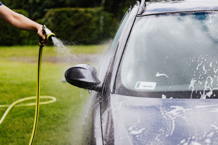 Washing a car with hose water conditioned by MagSert